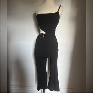 Free people one shoulder open side size 2 black jumpsuit.